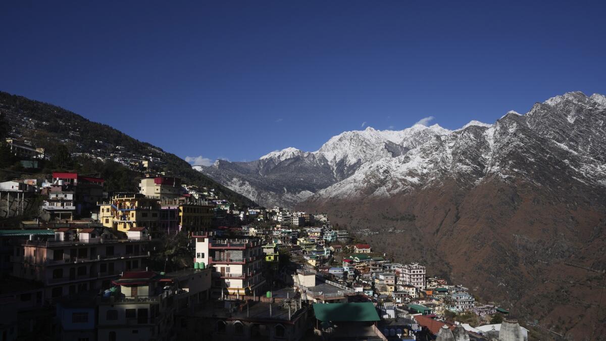 Joshimath town is seen along side snow capped mountains, in India's Himalayan mountain state of Uttarakhand on January. 21, 2023. — AP