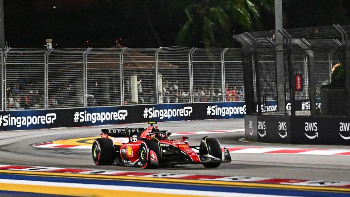 Ferrari's Spanish driver Carlos Sainz Jr drives during the final qualifying session of the Singapore Formula One Grand Prix night race at the Marina Bay Street Circuit. - AFP