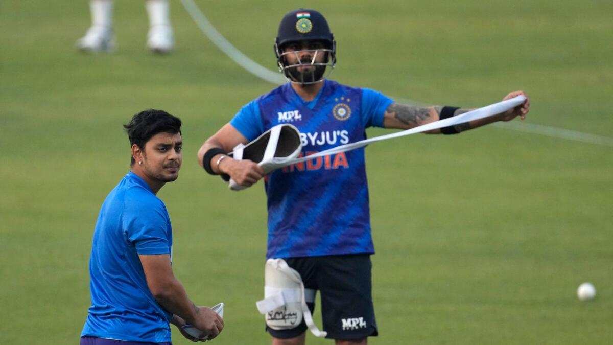 India's Ishan Kishan (left) and Virat Kohli during a training session in Kolkata on Tuesday. (AP)