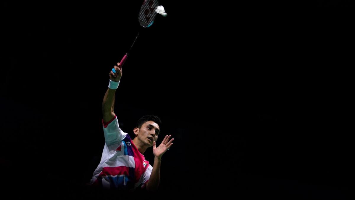 India's Lakshya Sen returns a shot to China's Zhao Jun Peng during their match in the BWF World Championships in Huelva, Spain, on Friday. — AP