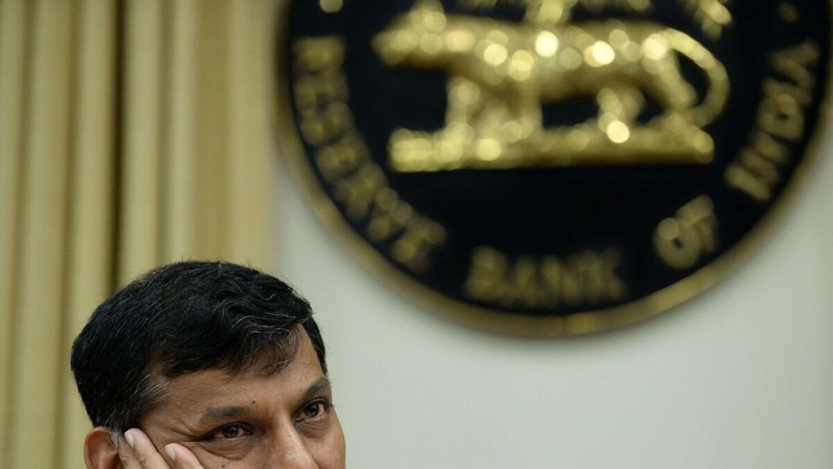 RBI Governor Rajan says ready to use FX reserves as Sensex tumbles
