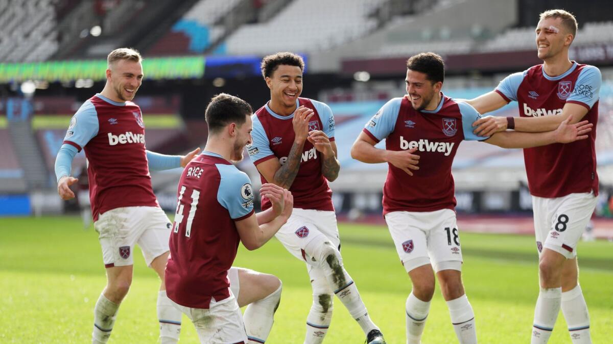 West Ham United's Jesse Lingard celebrates his goal with teammates during the match against Tottenham Hotspur. — Reuters
