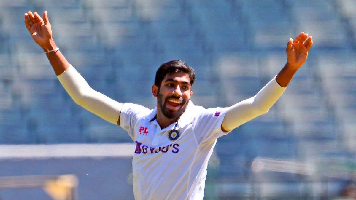 Jasprit Bumrah appeals successfully for the wicket of Australia's Joe Burns .— AFP