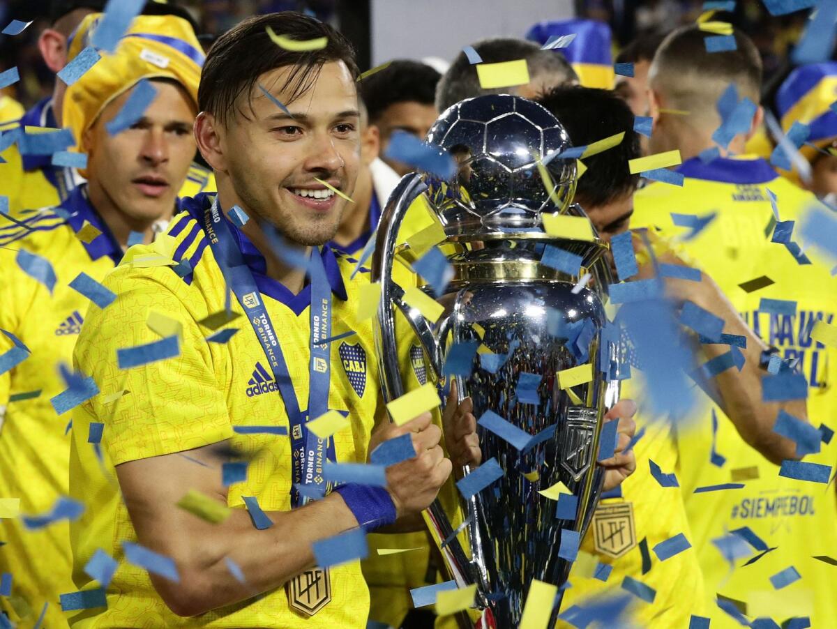 Boca Juniors' Paraguayan midfielder Oscar Romero holds the trophy after winning the Argentine Professional Football League on October 23, 2022. — AFP file