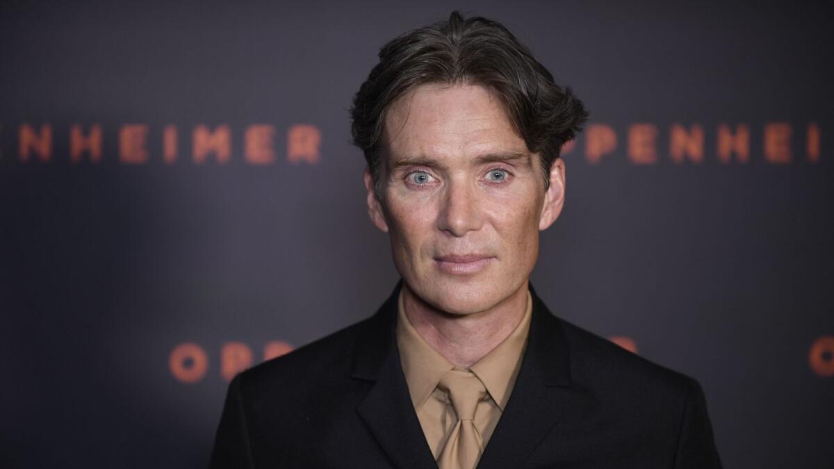 Irish actor Cillian Murphy poses upon his arrival for the 'Premiere' of the movie 'Oppenheimer' at the Grand Rex cinema in Paris on July 11, 2023. (Photo by JULIEN DE ROSA / AFP)