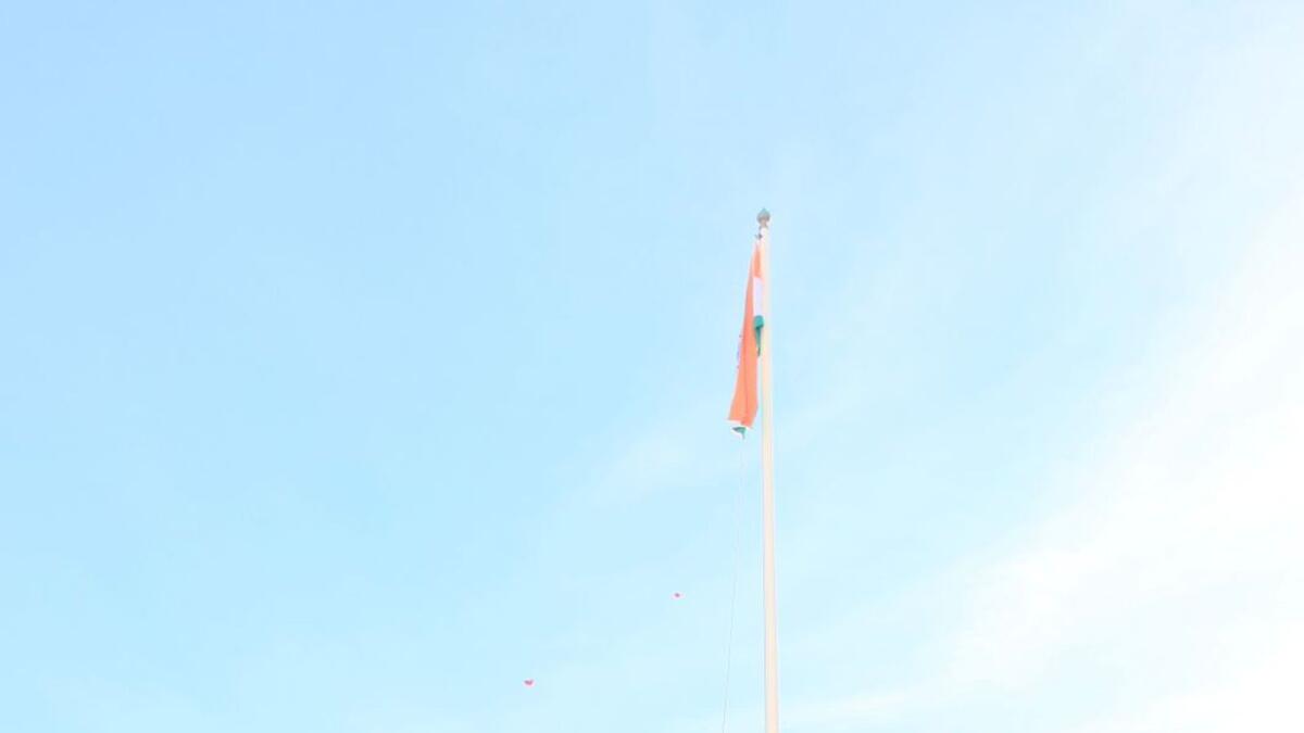 Sanjay Sudhir hoists Indian national flag during the Republic Day celebrations at the Indian Embassy in Abu Dhabi.