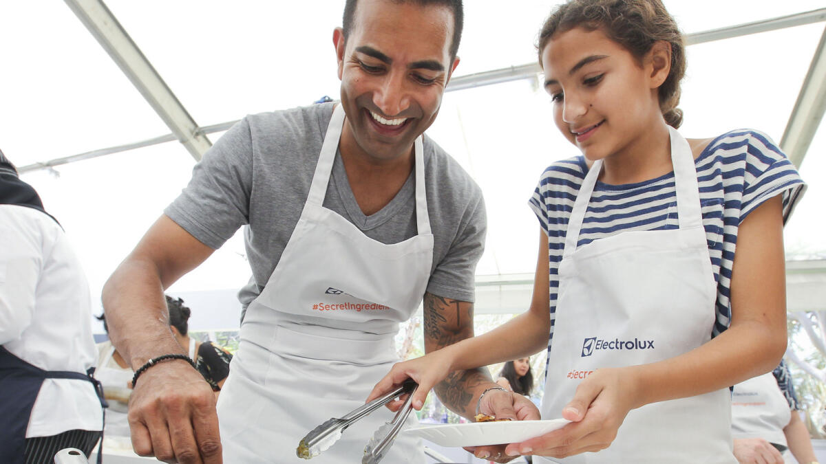 COOKING FOR DAD ... Eleven-year old Casia Bartlett says she’s afraid of the pan lest she burns herself but adds, “it’s been a fantastic experience to cook for her dad with the recipe by renowned chef Atul Kochhar.