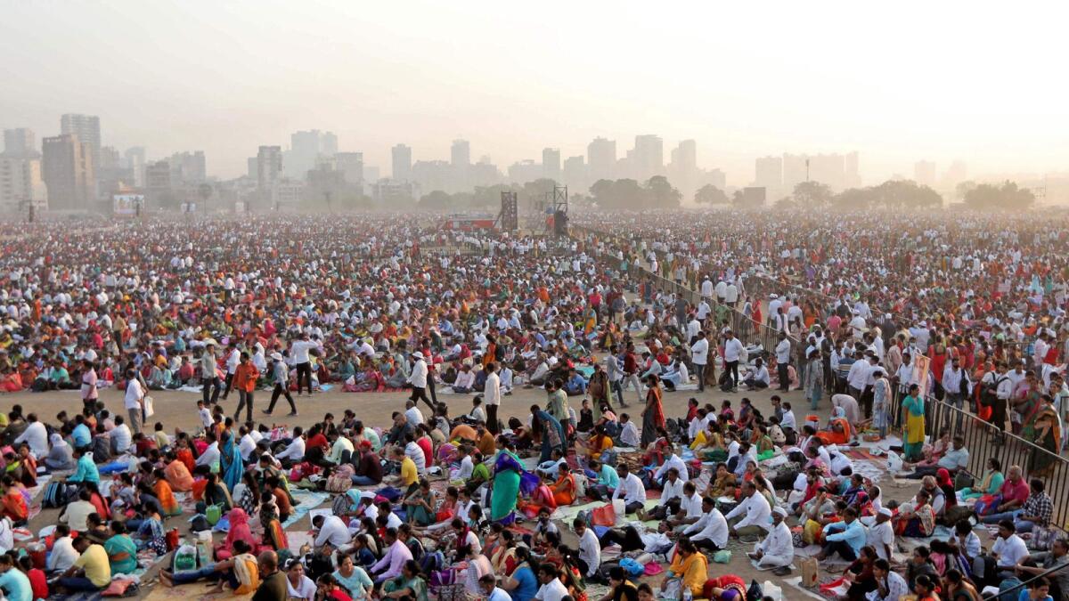 In this photograph taken on April 16, 2023, people gather to attend an award ceremony on the outskirts of Mumbai. — AFP