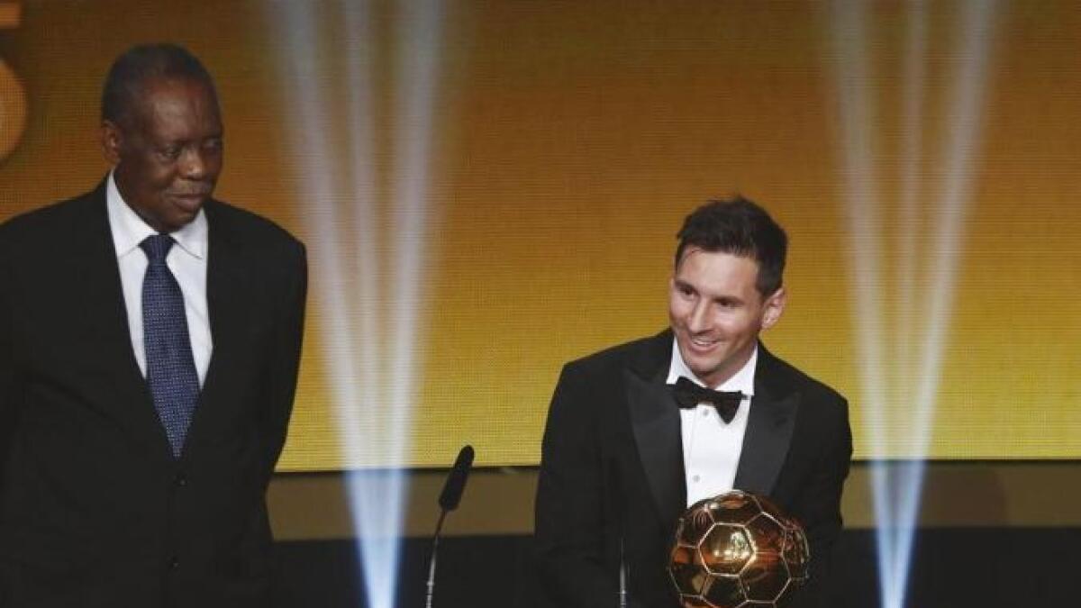 FC Barcelona's Lionel Messi of Argentina holds the Ballon d'Or in 2015. (Reuters file)
