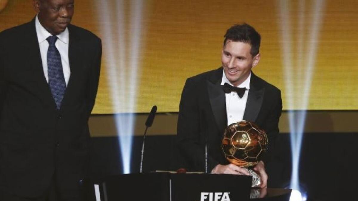 FC Barcelona's Lionel Messi of Argentina holds the Ballon d'Or in 2015. (Reuters file)