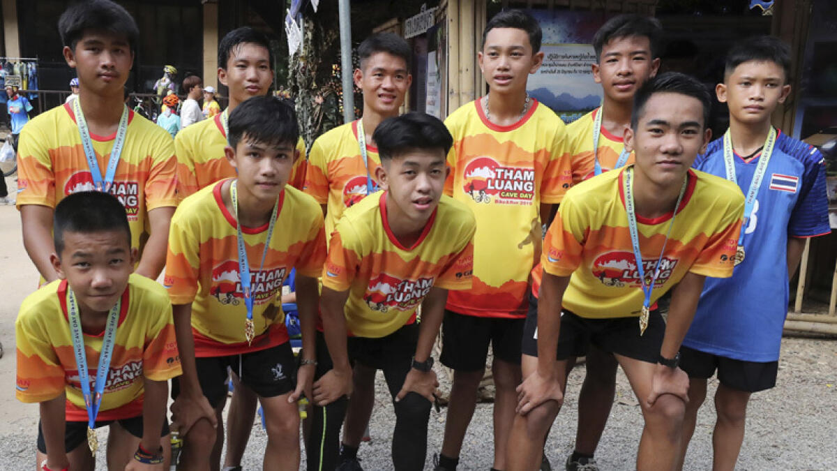 Photos: Thai soccer team marks cave rescue anniversary with run