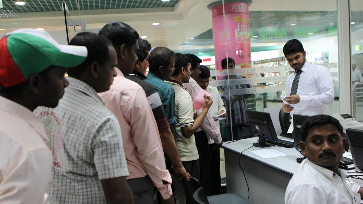 Amnesty seekers wait for their paper work at BLS service centre in Dubai.- KT file photo