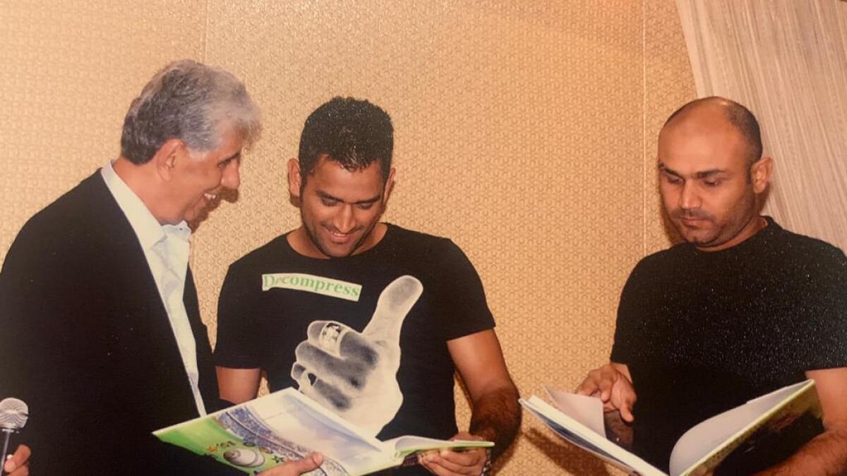 Shyam Bhatia at his book launch with MS Dhoni and Virender Sehwag. (Supplied photo)