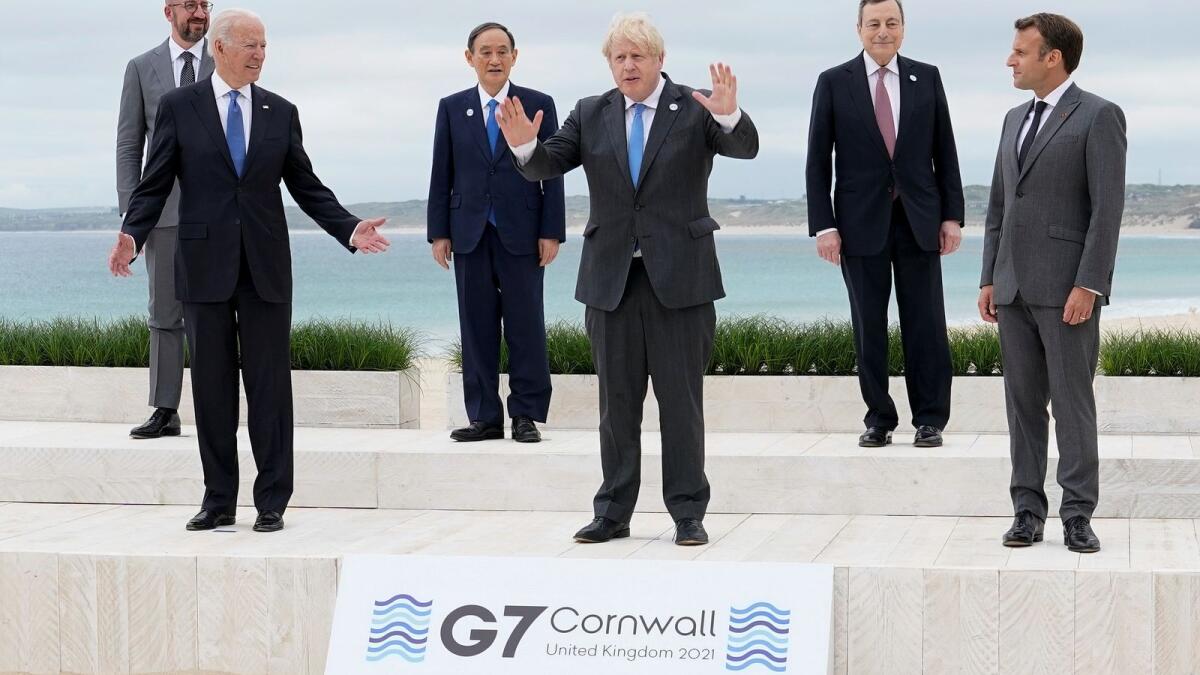 G7 leaders posing for a family photo in Carbis Bay, Cornwall.