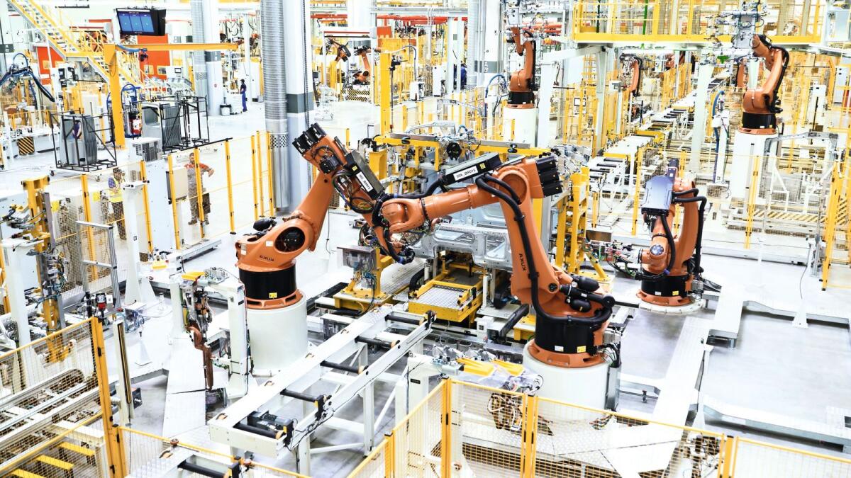 Robots working in production and manufacturing industry.