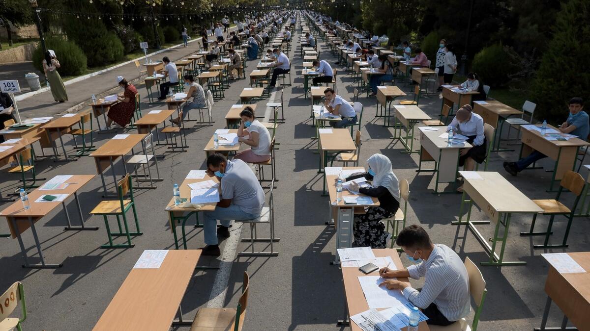 Uzbek students take open-air entrance exams in Tashkent amid the ongoing coronavirus disease pandemic. Photo: AFP
