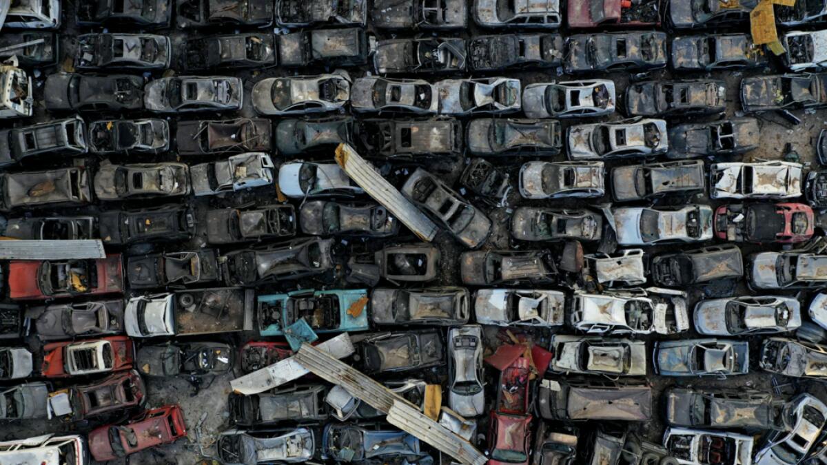 An aerial view shows imported vehicles damaged at the port of Beirut in the August 4 massive explosion that caused severe damage across swathes of the Lebanese capital, killed at least 181 people, injured more than 6,500 and left scores of people homeless. Photo: AFP