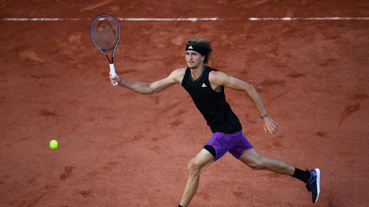 Germany's Alexander Zverev returns the ball to Germany's Oscar Otte during their men's singles first round match at French Open. — AFP