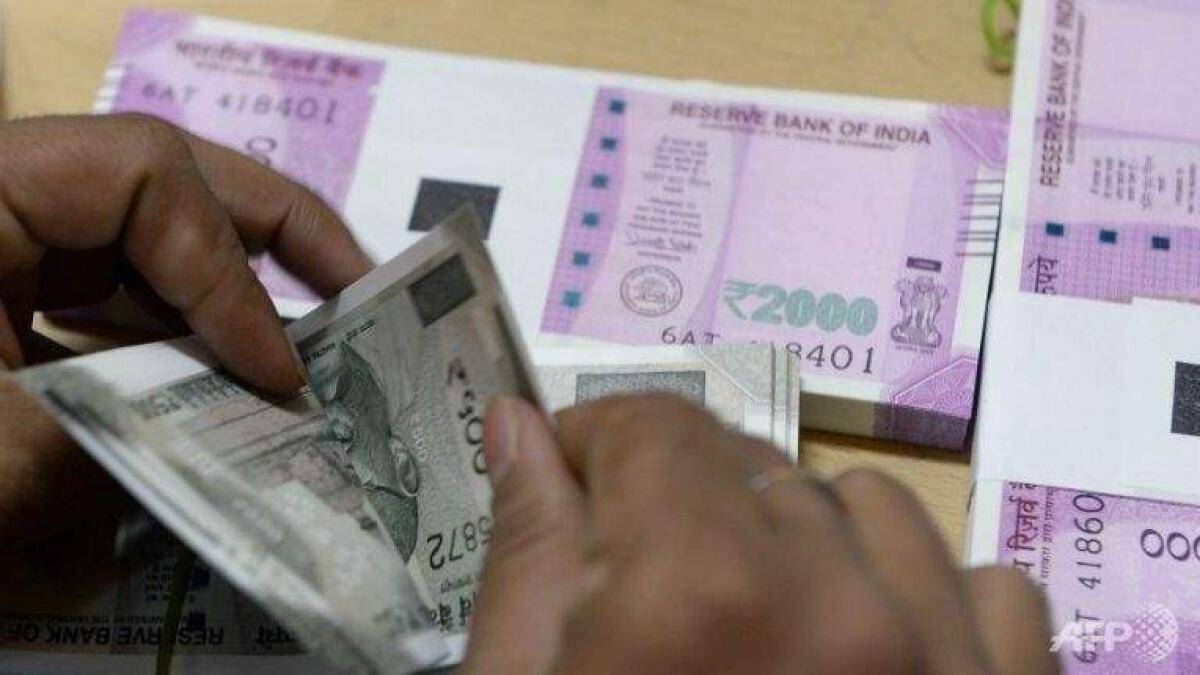 Rupee logs biggest single-day gain in 5 years, leaps 100 paise on crude respite     