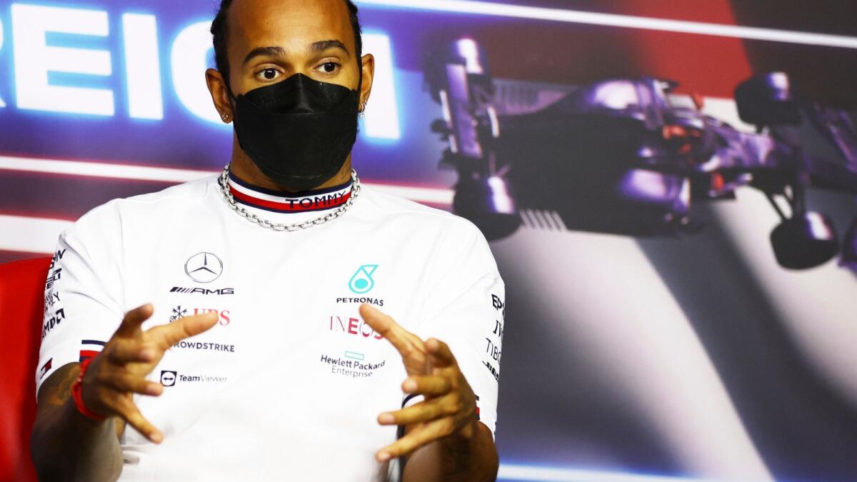 Lewis Hamilton of Britain attends a media conference ahead of the Austrian Formula One Grand Prix. — AP