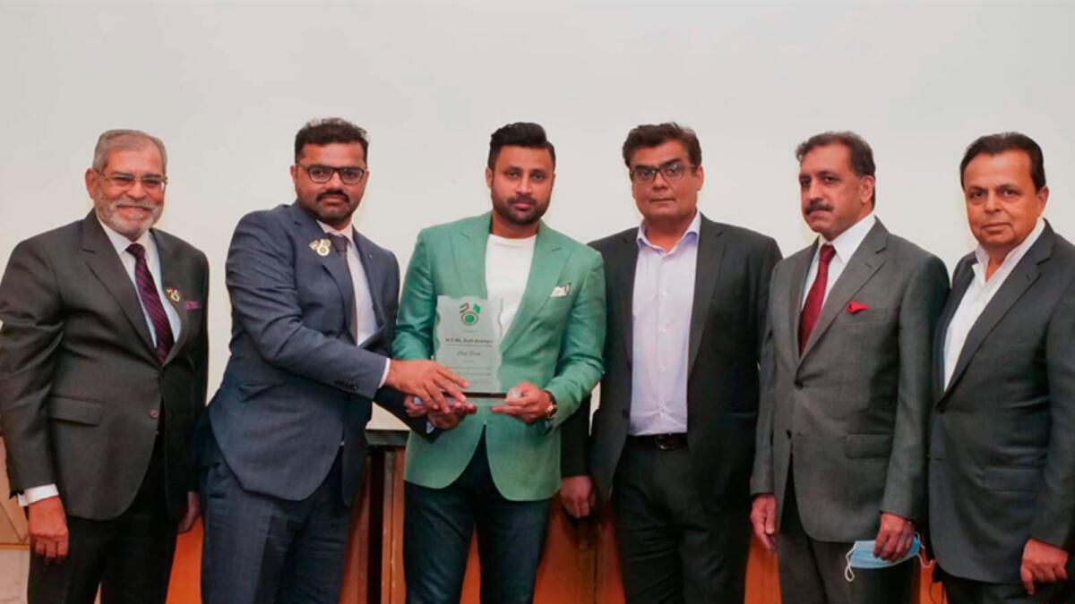 Ahmed Shaikhani, president, PBC Dubai; Syed Zulfiqar Bukhari, special assistant to Prime Minister Imran Khan; Afzaal Mahmood, Pakistan Ambassador to the UAE;  and Imran Chaudhry along with a guest at   an event held in Dubai recently. — Supplied photo