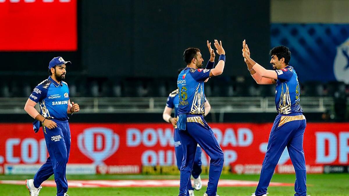 Jasprit Bumrah celebrates the wicket of Daniel Sams with his teammates. — IPL