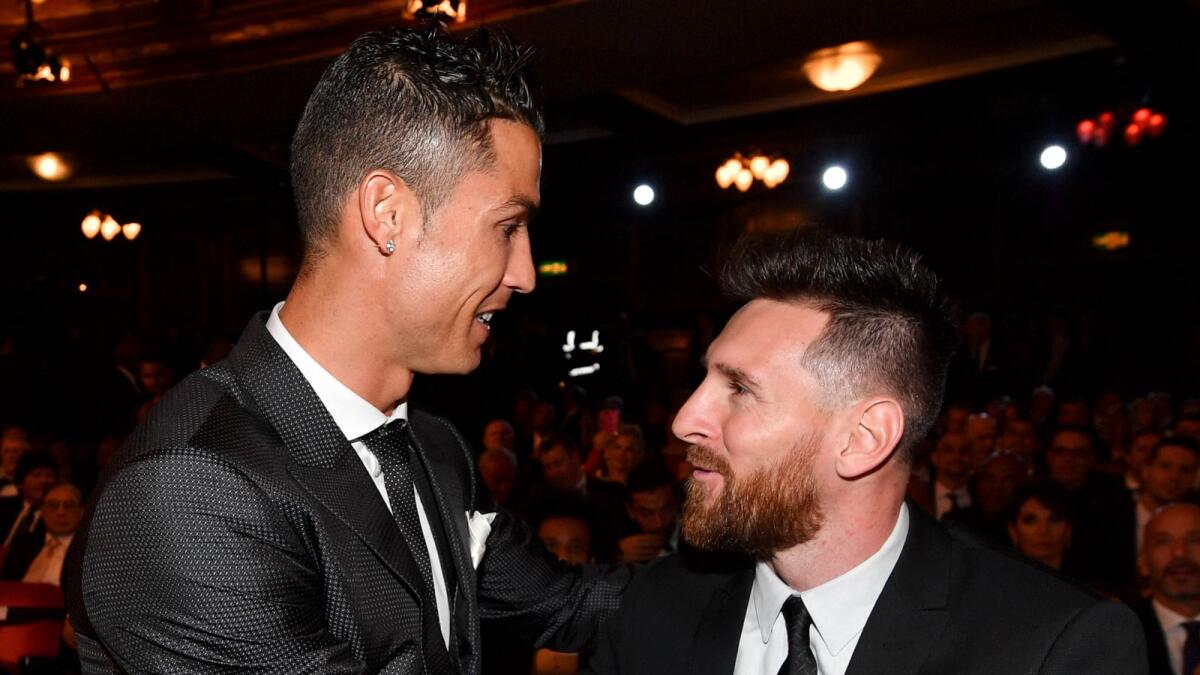 Lionel Messi (right) and Cristiano Ronaldo. Photo: AFP file