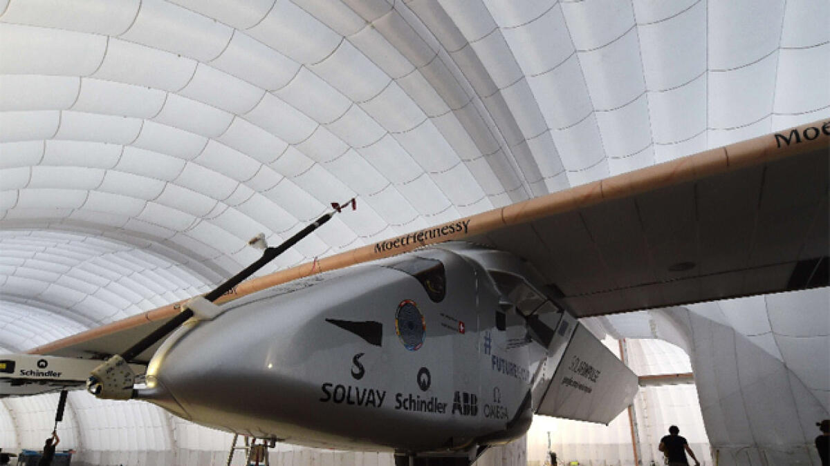 Solar plane, ready to go, waiting out weather front in Japan