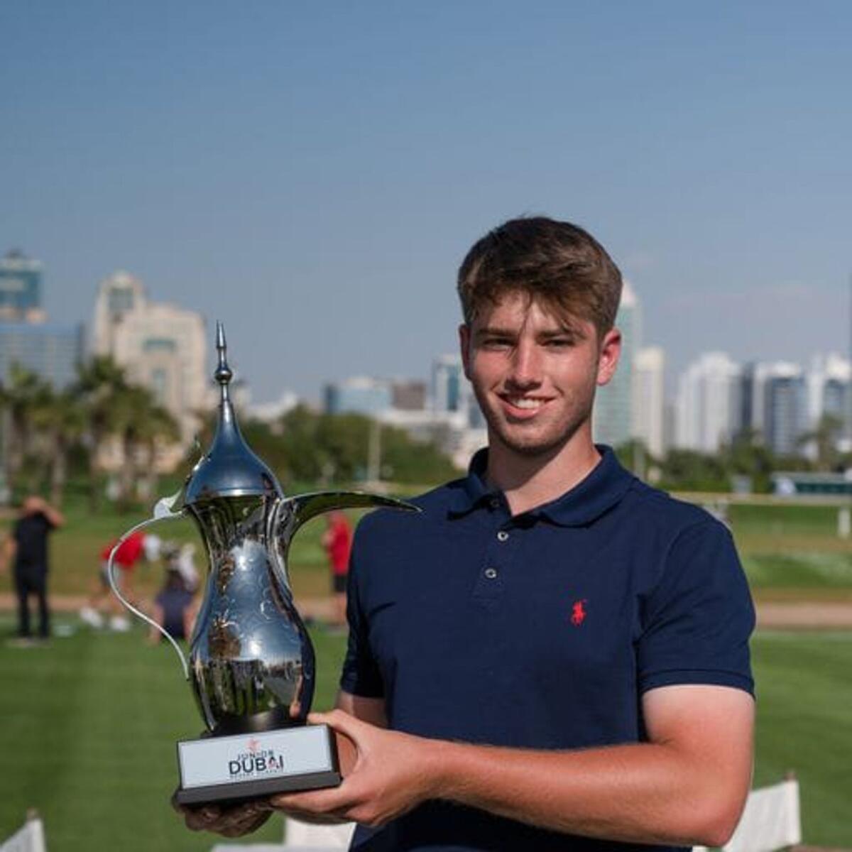 Joe Jones from Wales with the Junior Dubai Desert Classic trophy. Photo: Supplied