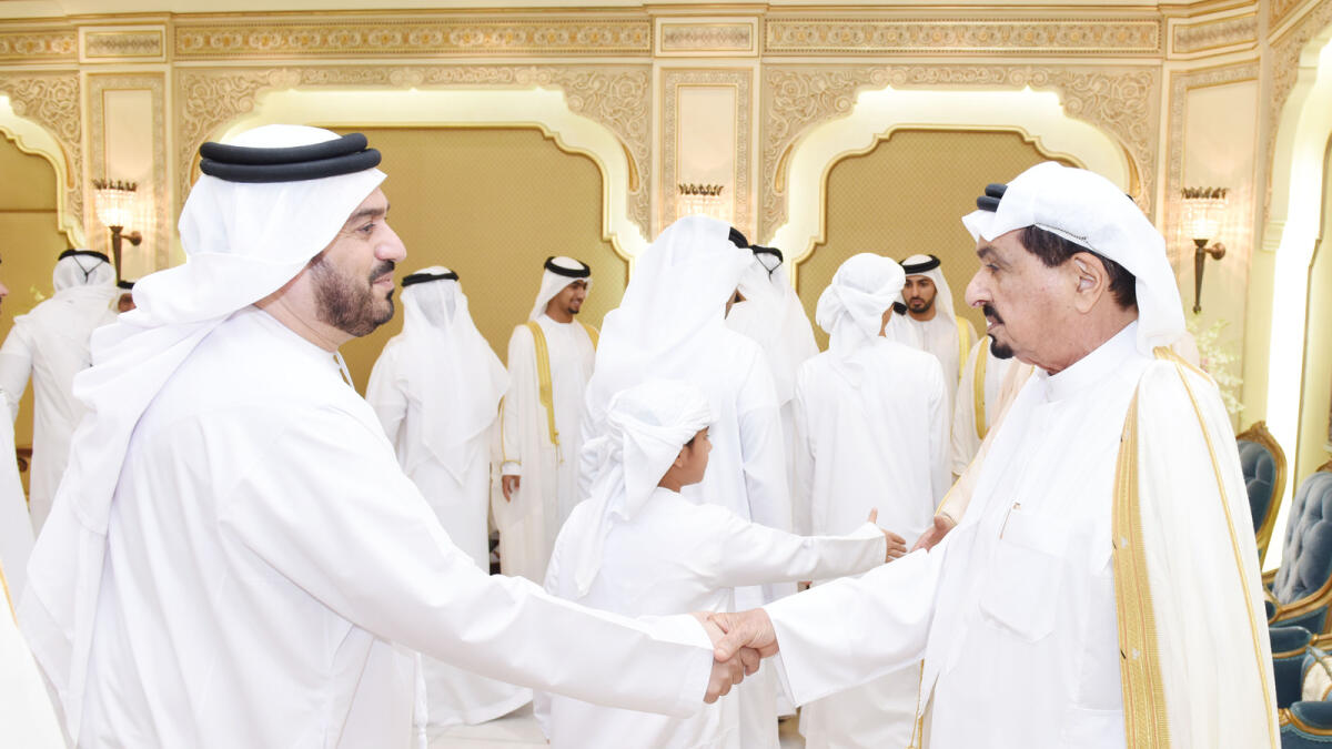 Shaikh Humaid exchange greetings with Shaikhs, senior officials and other dignitaries after Eid Al Adha prayers at the Shaikh Rashid bin Humaid Al Nuaimi Mosque in Ajman.