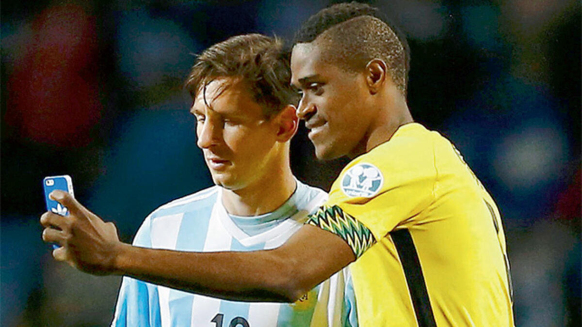 Messi caught off guard by selfie moment with Brown