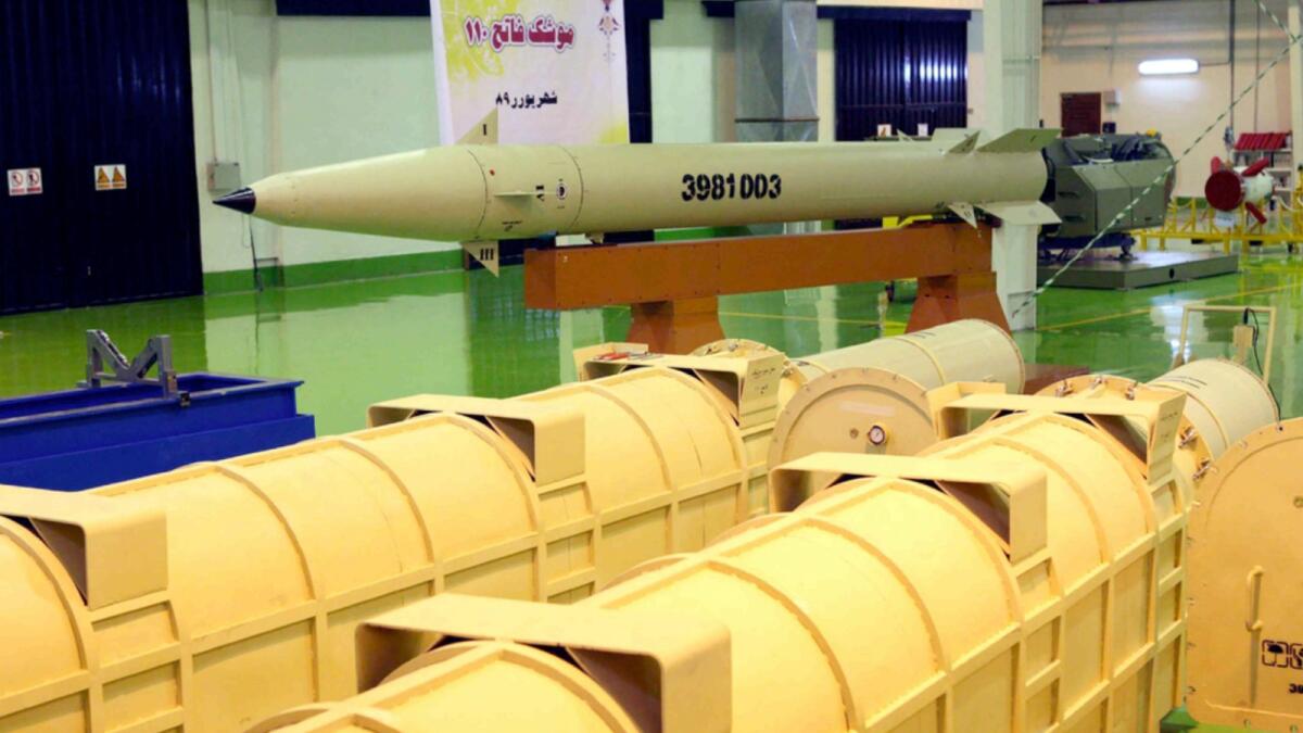 Iranian Defence Ministry shows surface-to-surface Fateh-110 missile at an undisclosed location, in Tehran. — AP file