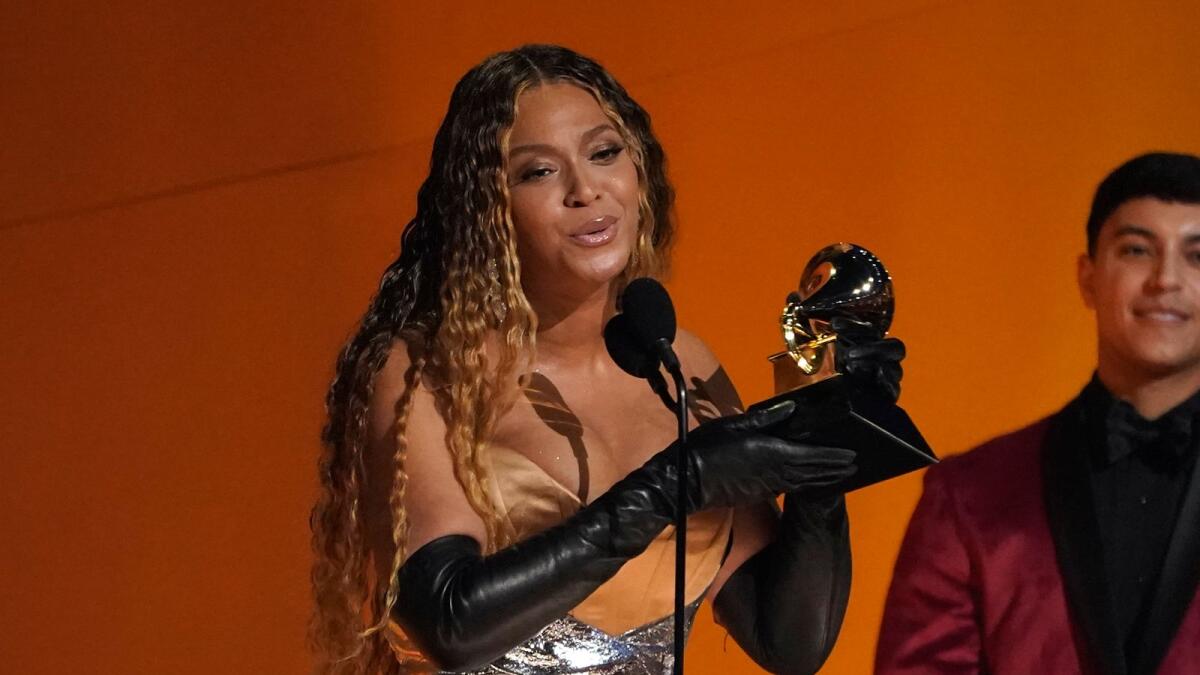 Beyonce accepts the award for Best Dance/Electronic Music Album