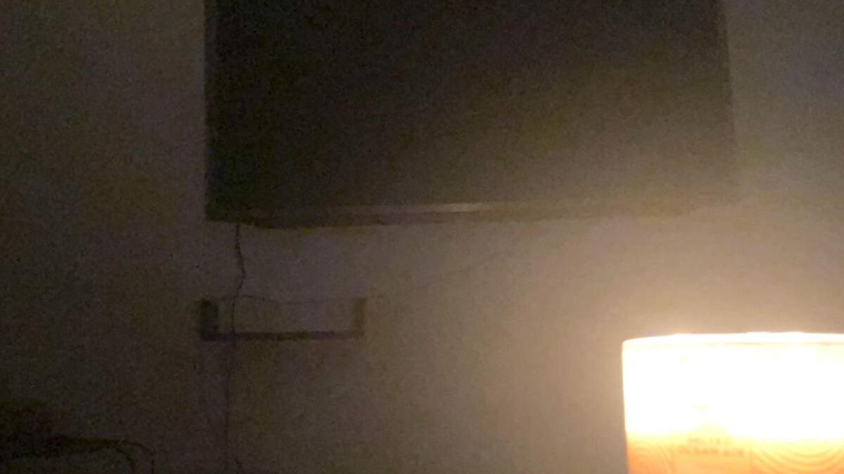 A lit candle at an apartment in Dubai Marina which had its utilities cut off by the landlord in wake of the Evernest holiday home rental scam. (Supplied)