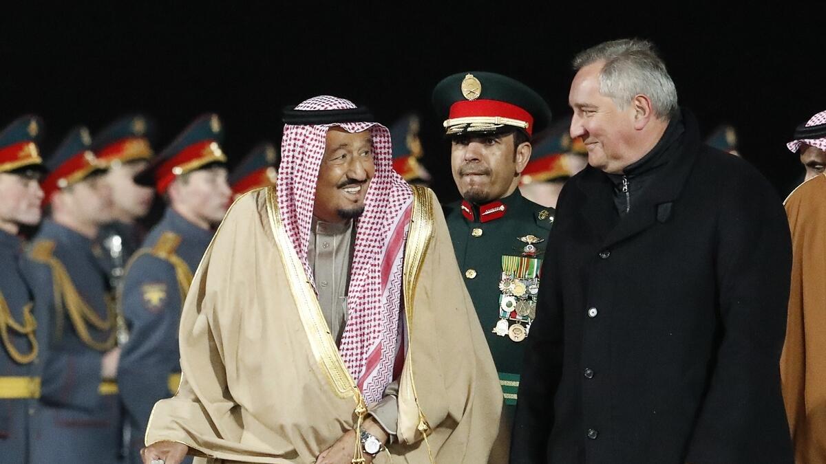King Salman (L) speaks with Russian Deputy Prime Minister Dmitry Rogozin (R) during a welcoming ceremony upon his arrival at Vnukovo airport outside Moscow, Russia.- Reuters