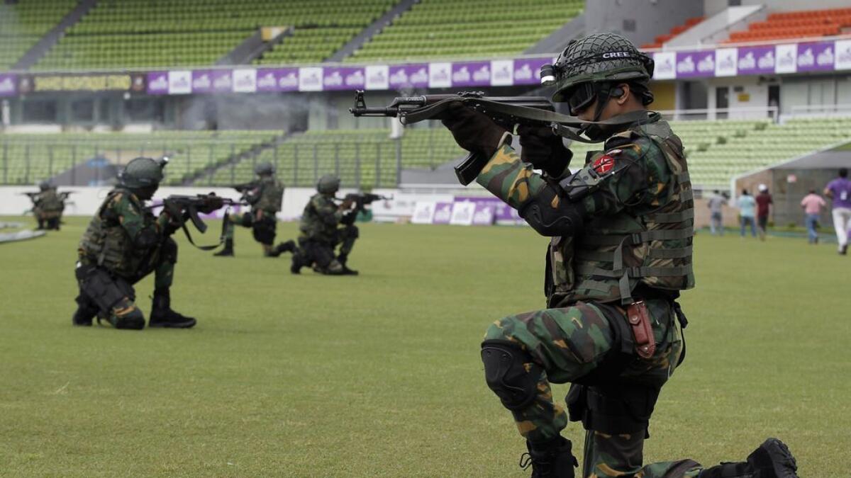 Bangladeshi security forces participate in security drill for the upcoming cricket series between Bangladesh and England in Dhaka, Bangladesh on Thursday.