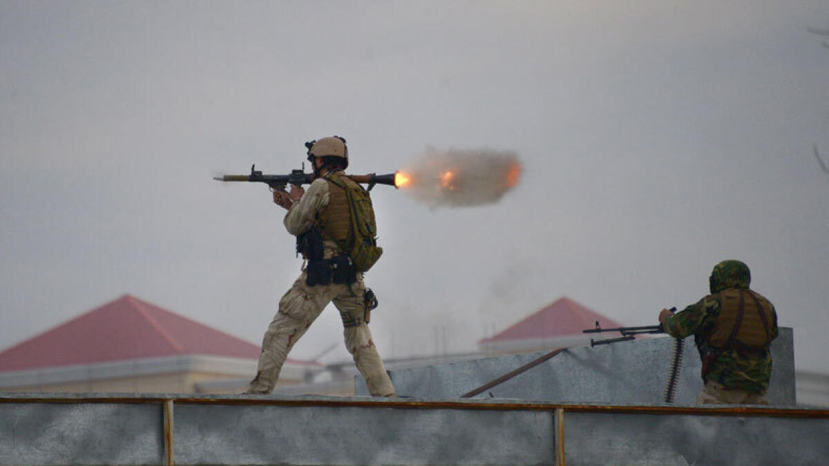 An Afghan Quick Reaction Force (QRF) soldier fires a rocket-propelled grenade (RPG) launcher during an operation near the Indian consulate in Mazar-i-Sharif on January 4, 2016. (Photo: AFP)