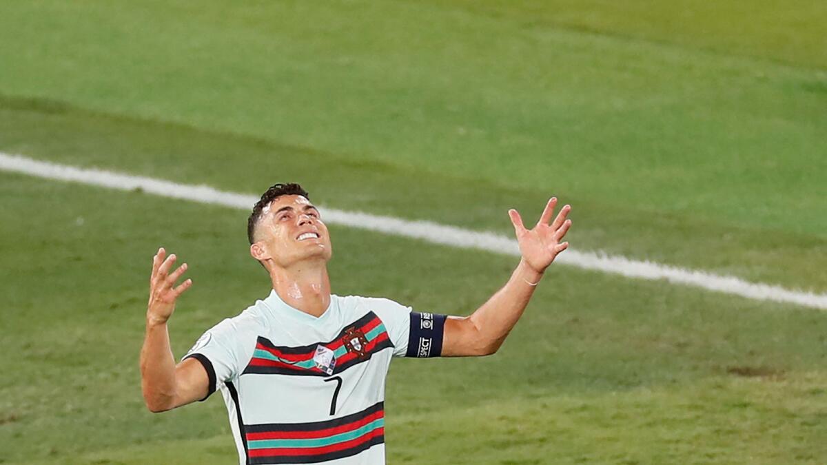 Portugal's forward Cristiano Ronaldo reacts during the Euro 2020 round of 16 match against Belgium. — AFP