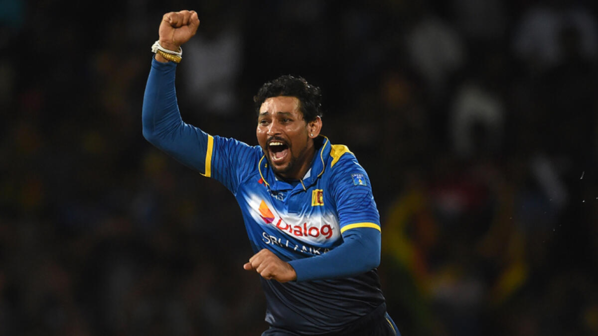 Dilshan said he was forced to keep Australia's Glenn McGrath as 12th man because of Wasim and Walsh. -- AFP file