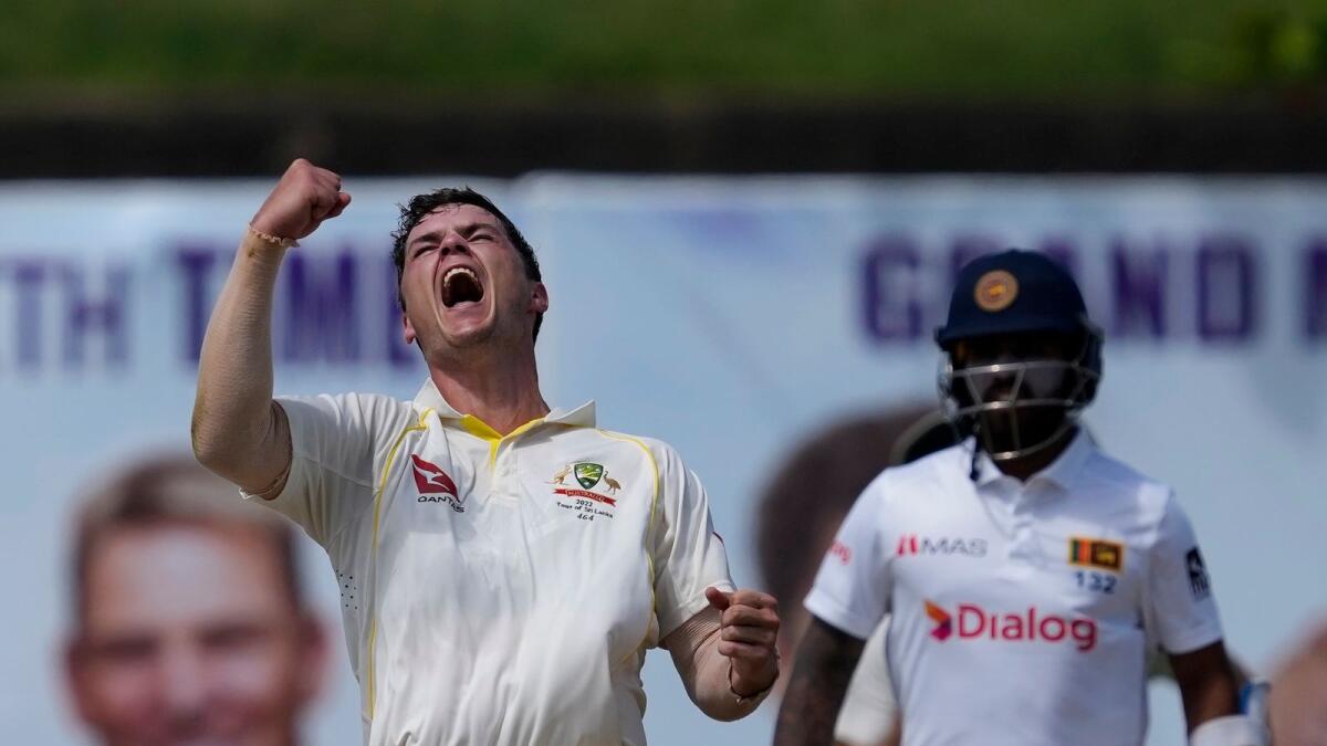 Australia's Mitchell Swepson reacts after taking the wicket of Sri Lanka's Pathum Nissanka during the first Test in Galle. (AP)
