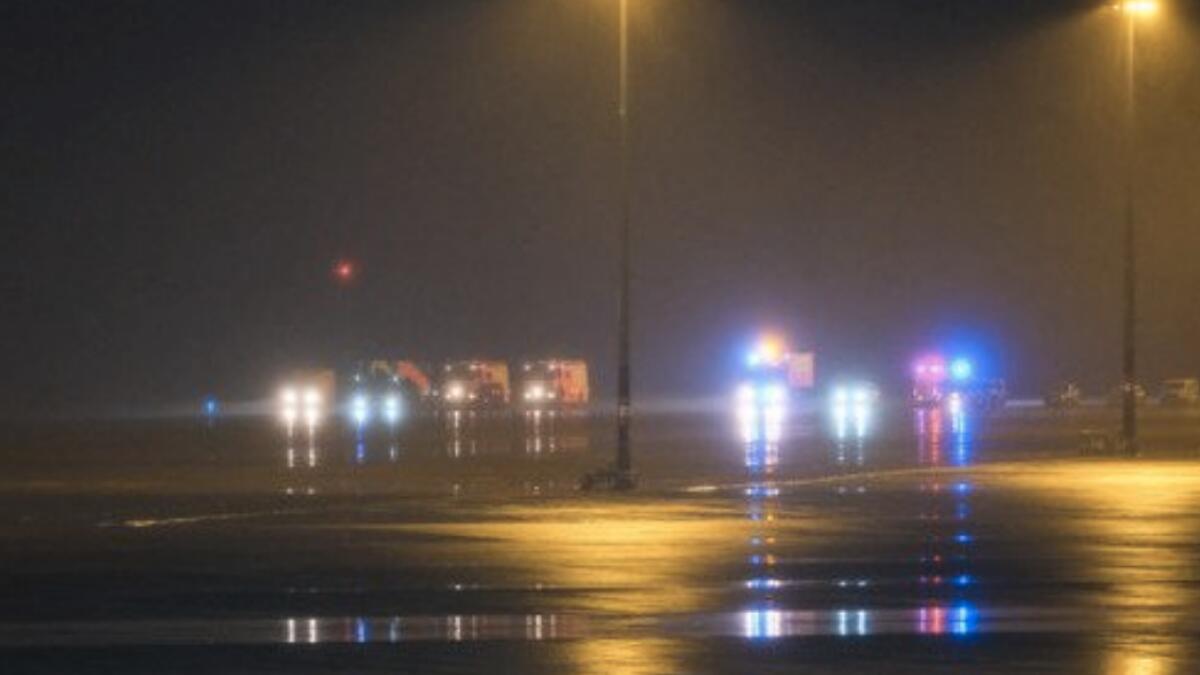 Airport suspends flights after man crashes car onto runway