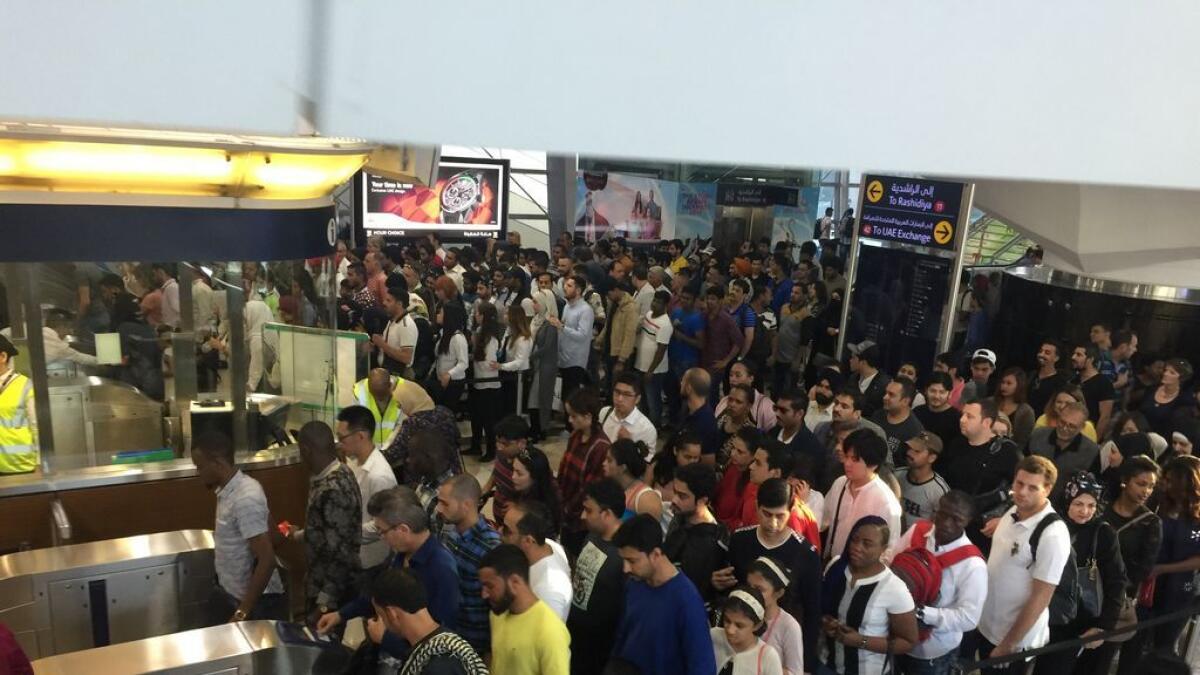 Crowd sat the Dubai Mall Metro Station during the New Year's Eve on Saturday, December 31, 2016.