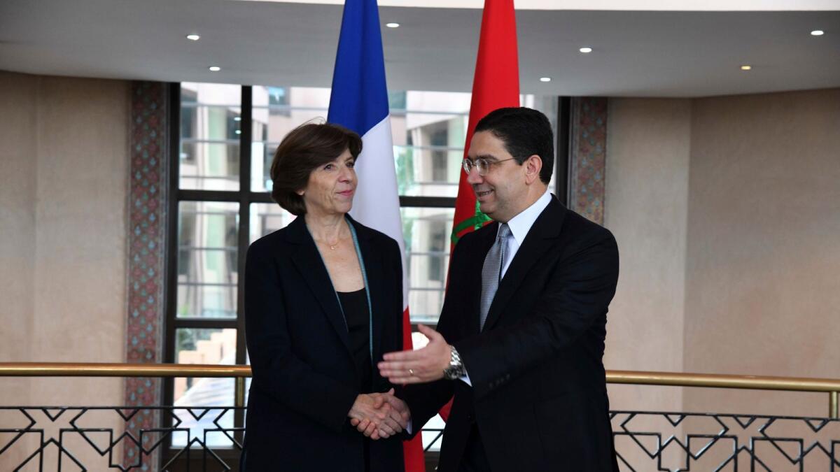 Morocco's Foreign Minister Nasser Bourita welcomes France Foreign Minister Catherine Colonna as she starts an official visit to Rabat, Morocco, on Friday. — AP