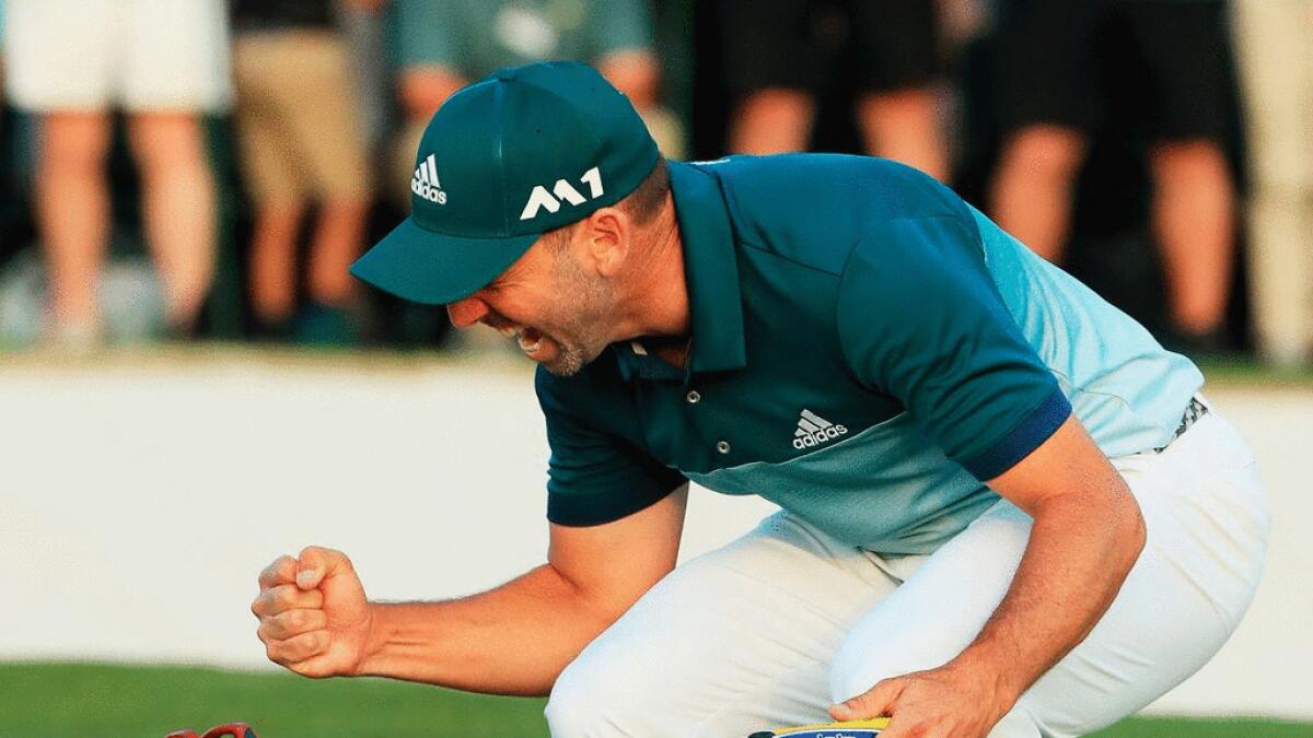 Sergio Garcia pumps his fists in celebrations after winning the  2017 Masters Tournament at Augusta National Golf Club on Sunday.
