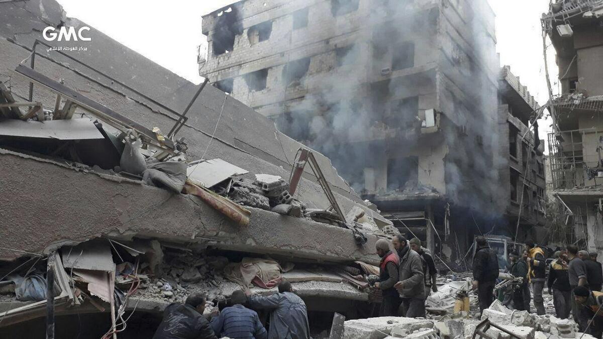 Air strike kills Syrian family of nine in rebel-held Ghouta