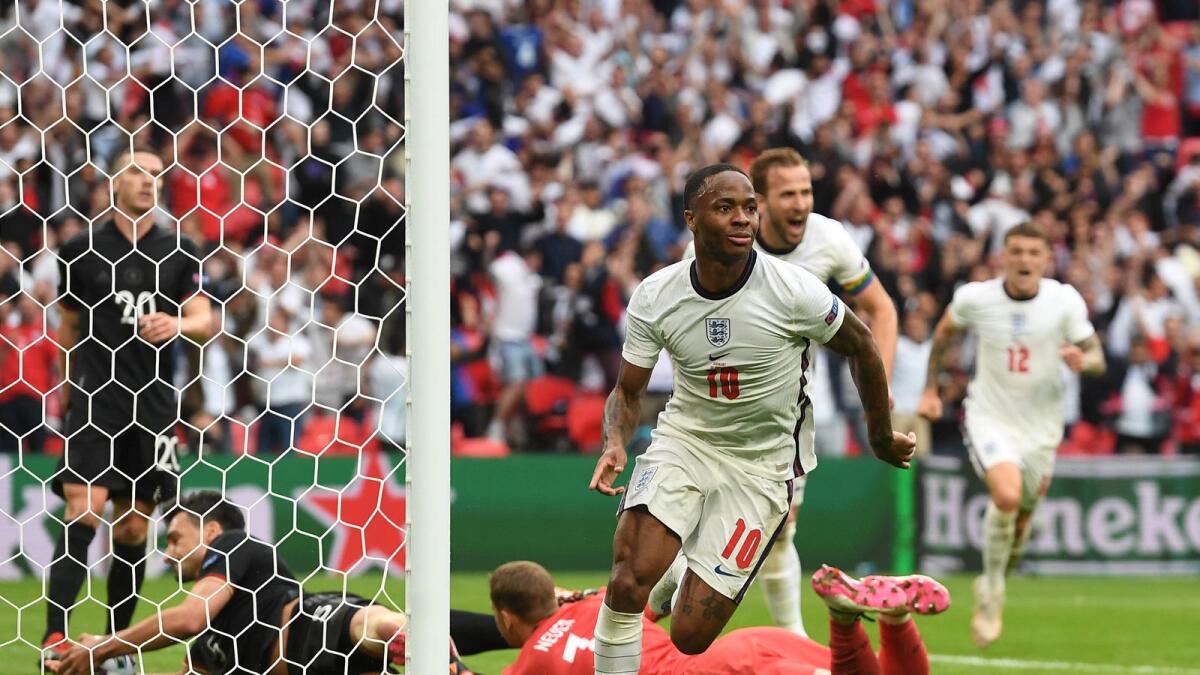 England forward Raheem Sterling celebrates after scoring the opening goal during the Euro 2020 match against Germany. (AFP)