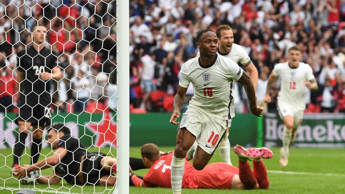 England forward Raheem Sterling celebrates after scoring the opening goal during the Euro 2020 match against Germany. (AFP)