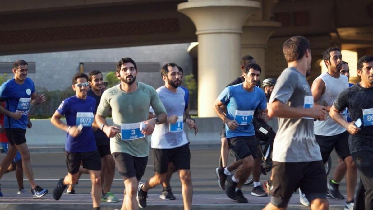 Sheikh Hamdan bin Mohammed led the first Dubai Run on Sheikh Zayed Road in 2019. File photos courtesy: Government of Dubai Media Office/Twitter