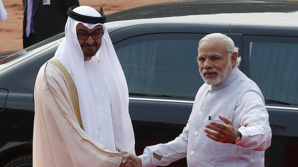 His Highness Shaikh Mohammed bin Zayed Al Nahyan, Crown Prince of Abu Dhabi and Deputy Supreme Commander of the UAE Armed Forces, shakes hands with India's Prime Minister Narendra Modi during his ceremonial reception at the forecourt of India's Rashtrapati Bhavan presidential palace in New Delhi, India, February 11, 2016.