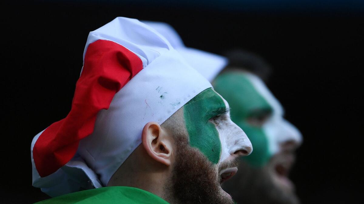 Italian fans sing before the start of the Euro 2020 semifinal between Italy and Spain at Wembley. (AFP)